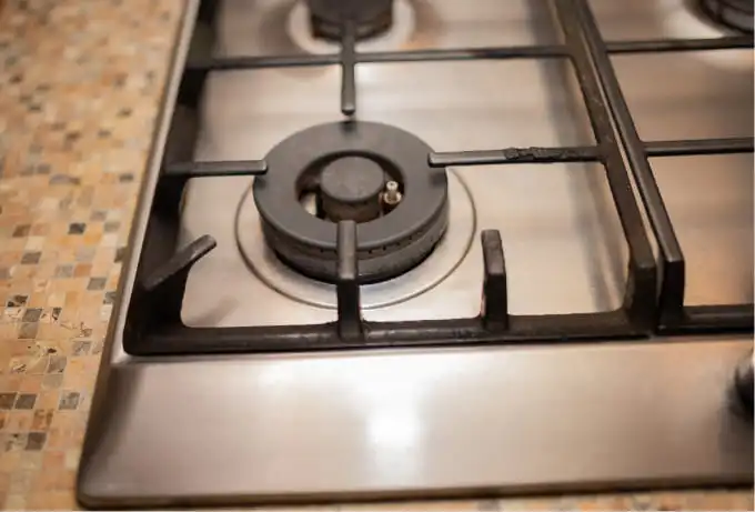 Clean gas stovetop after using Synoshi