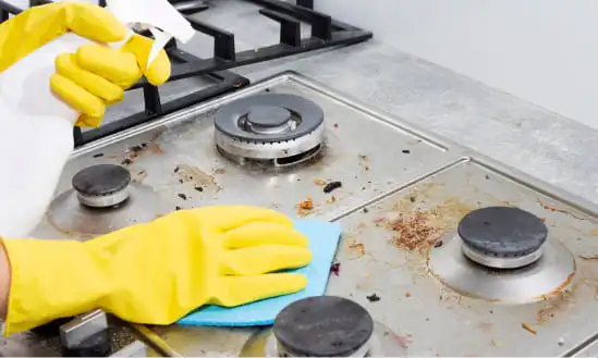 Cleaning a greasy gas stovetop